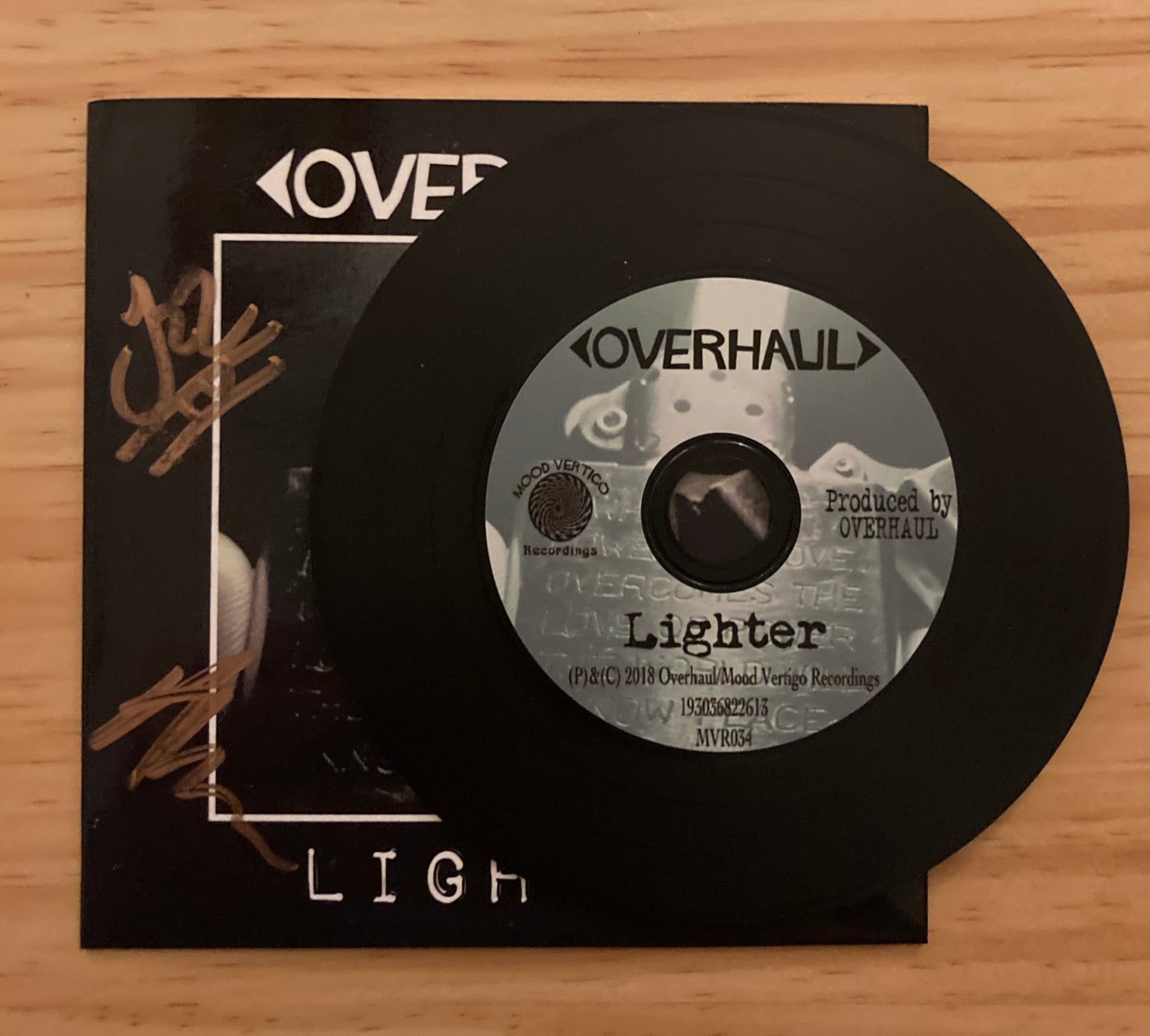 OVERHAUL Lighter front cover and CD digipak 