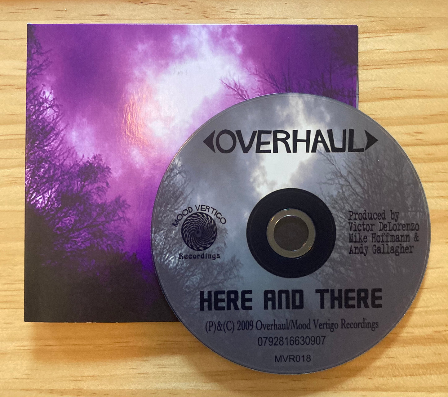 OVERHAUL Here and There CD front cover and CD.